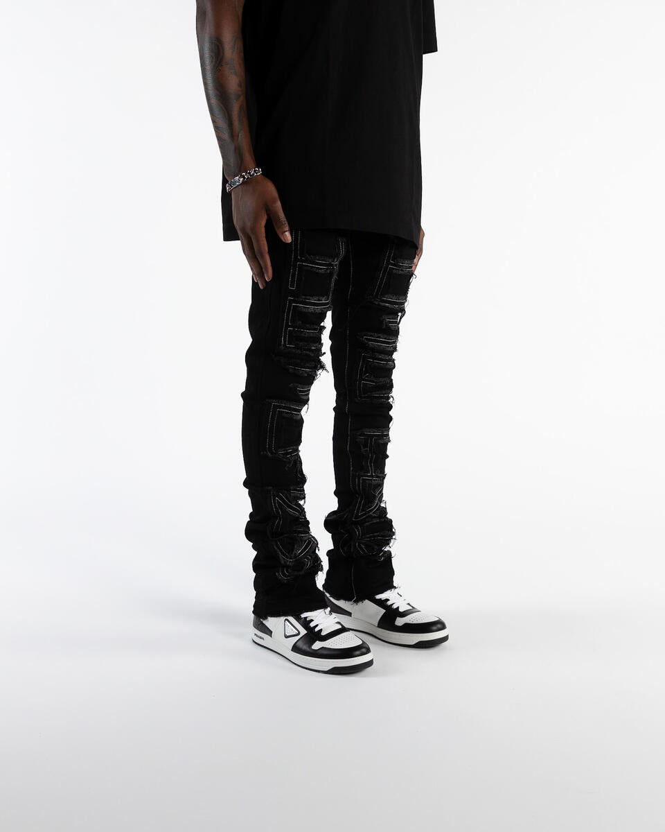 INSPIRED BY" FLARE STACK DENIM